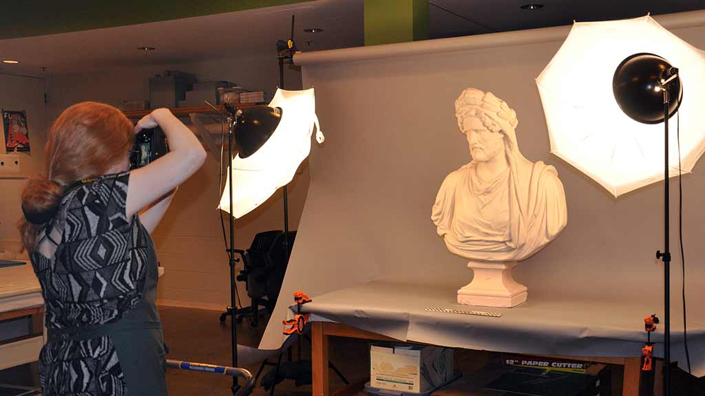Plaster cast busts are prepared for loan