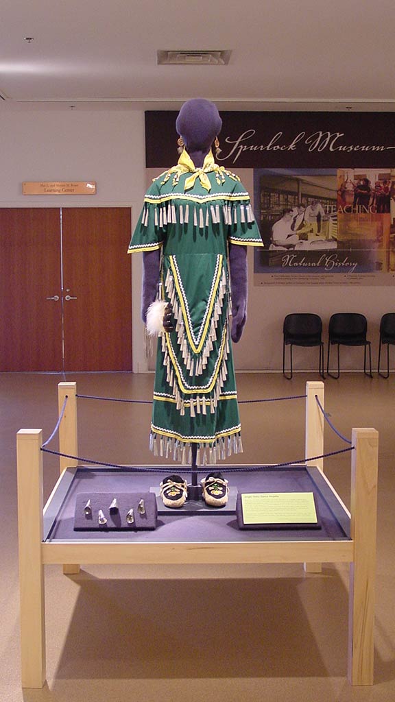 green dress with white fringes