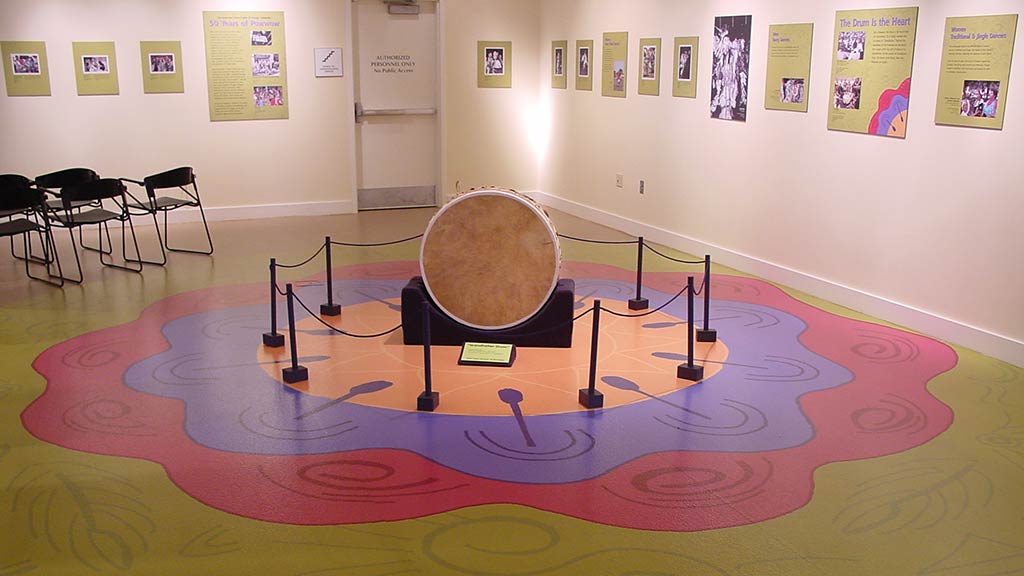 front of yellow and white drum