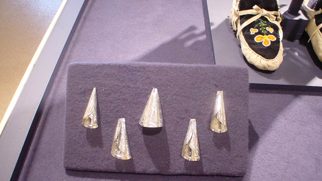 shinny silver trangular object