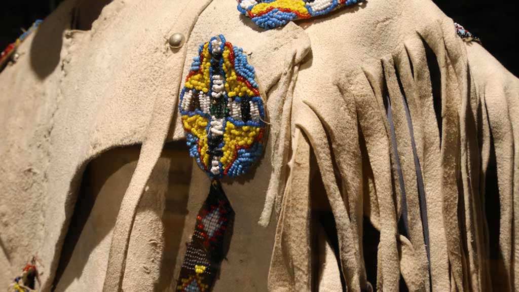 closeup of the beadwork on the shirt