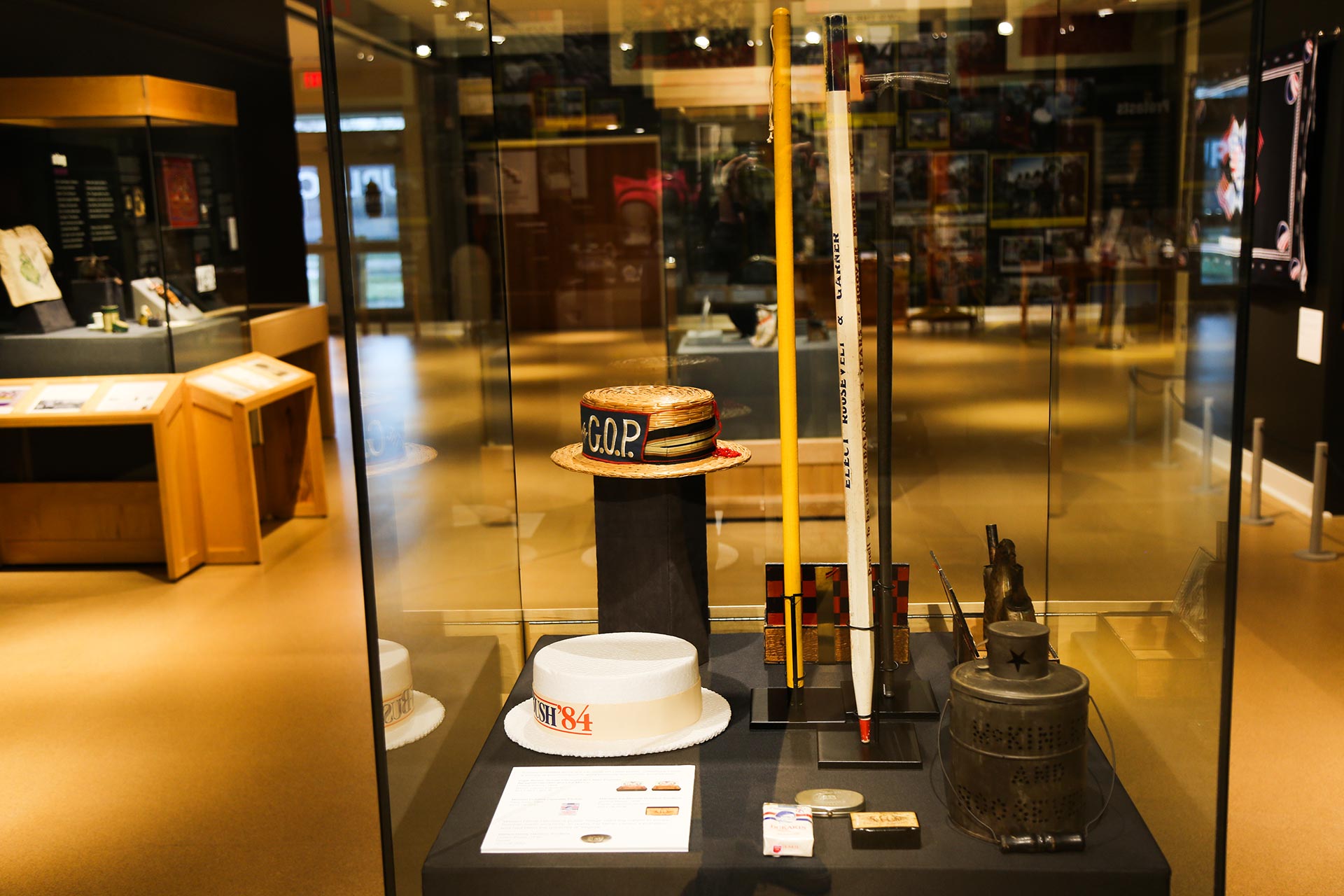 case with artificats including Bush '84 hat and GOP hat