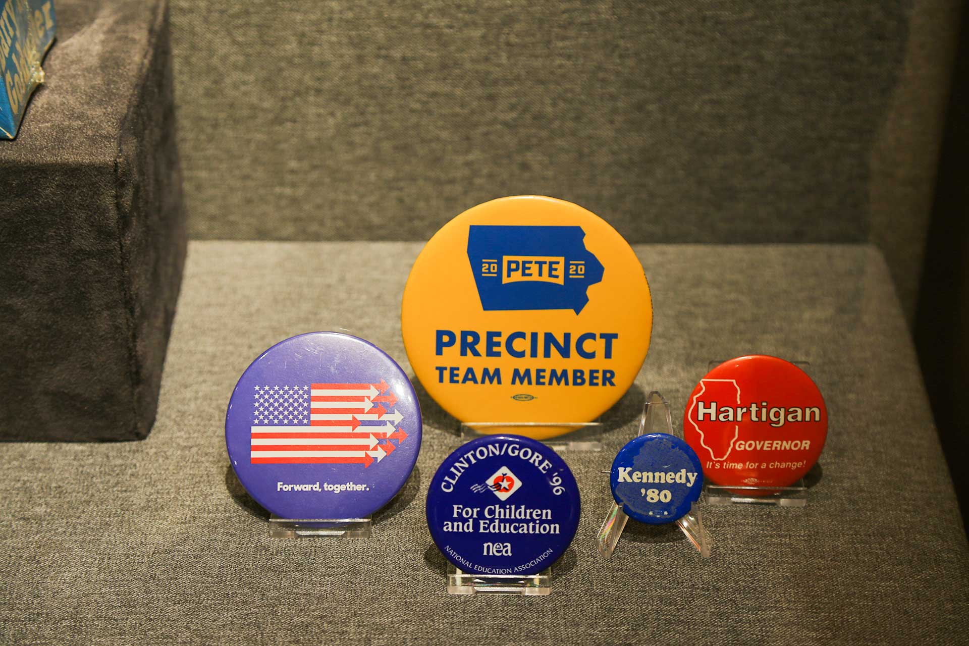 picture of 5 pins with various text
