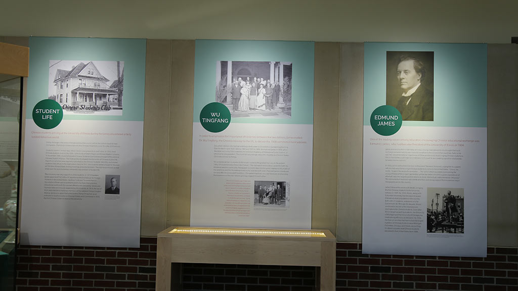 a wall of 3 large posters titled student life, Wu TingFang, Edmund James