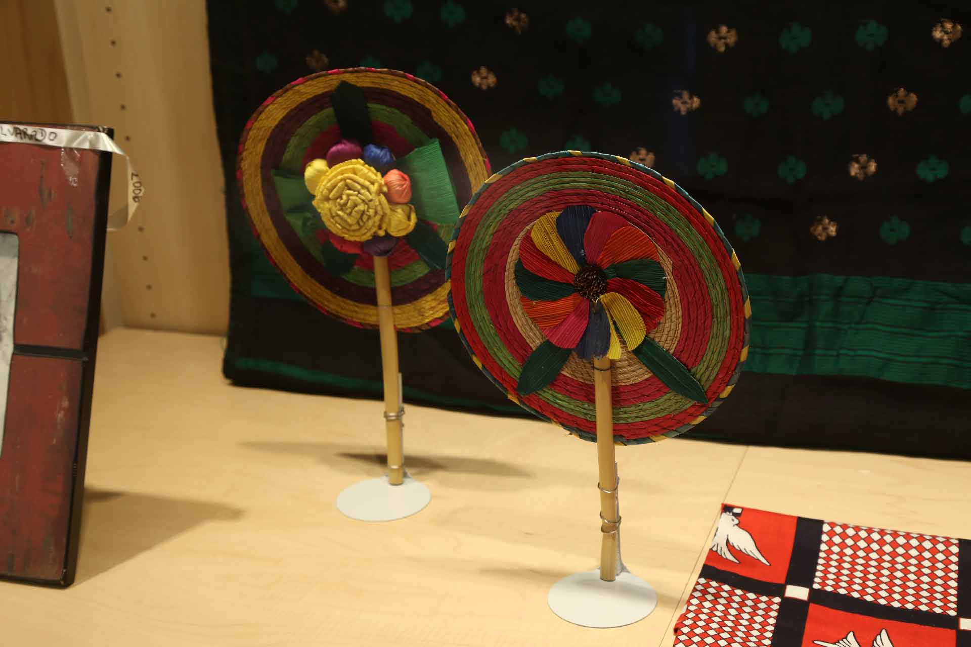 colorful woven crafts that almost resemble little sun hats