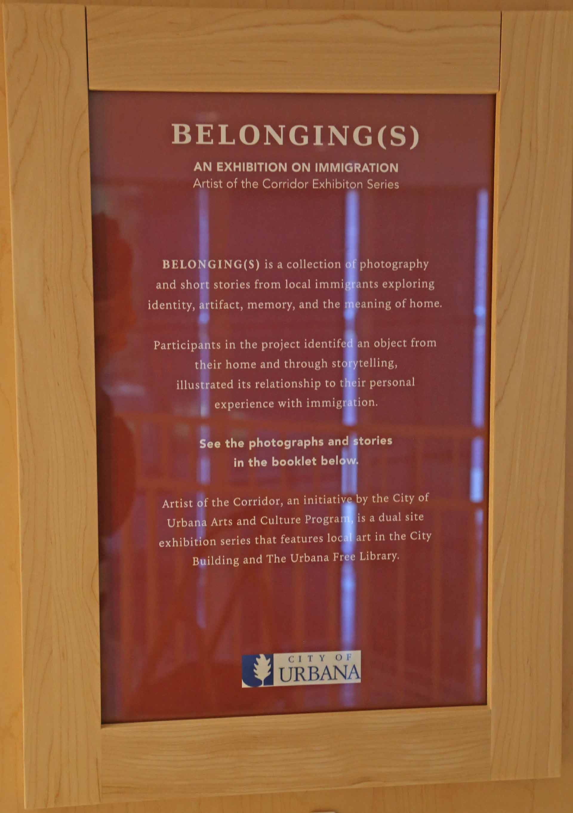 closeup of the exhibit title reading: 'BELONGING(S): an exhibition on immigration'