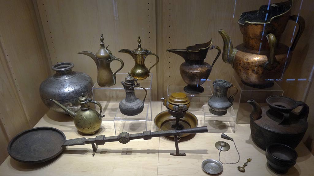 various tea pots and a large apparatus presumably tea related
