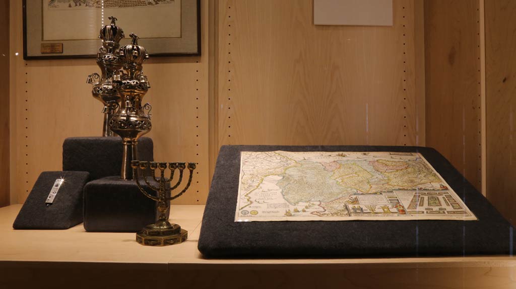 4 metal objects and a map