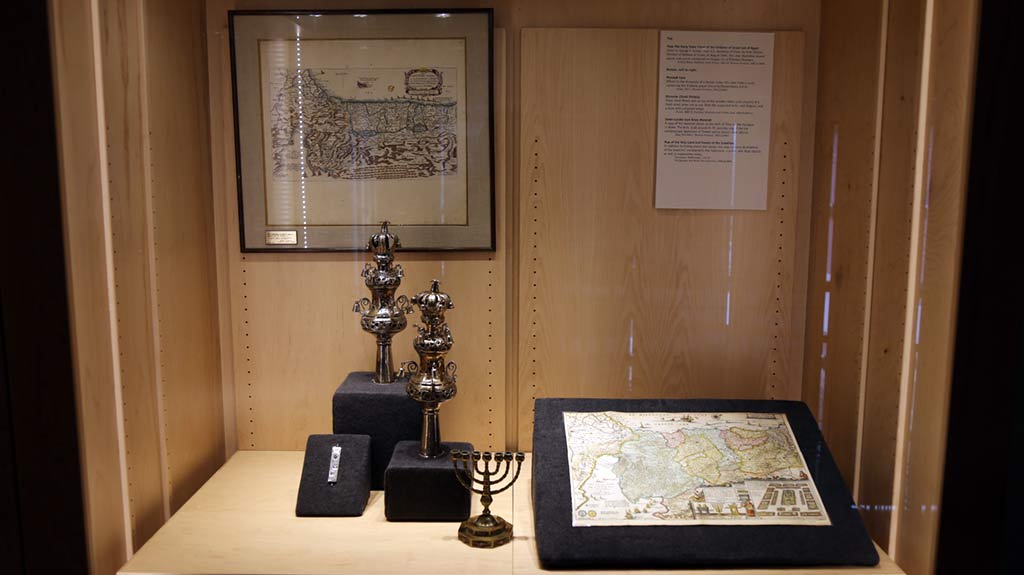 4 metal objects and two map