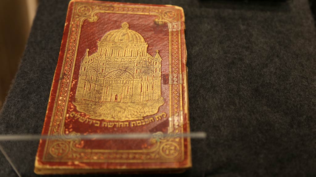 golden castle printed on the red cover of a book