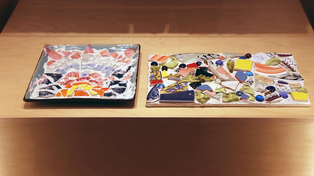 a close-up of the bottom shelf in the left case