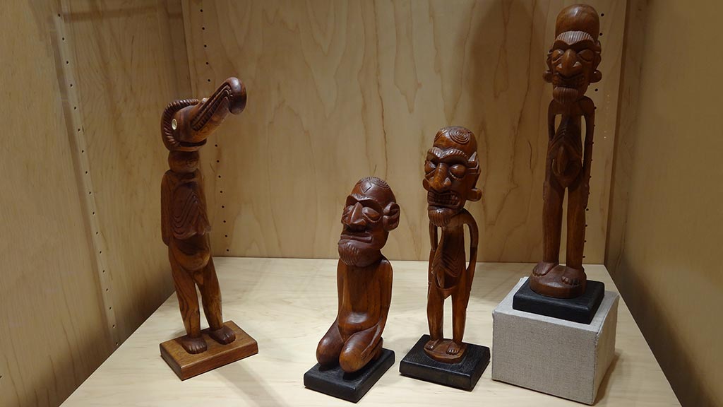 wooden carvings of men