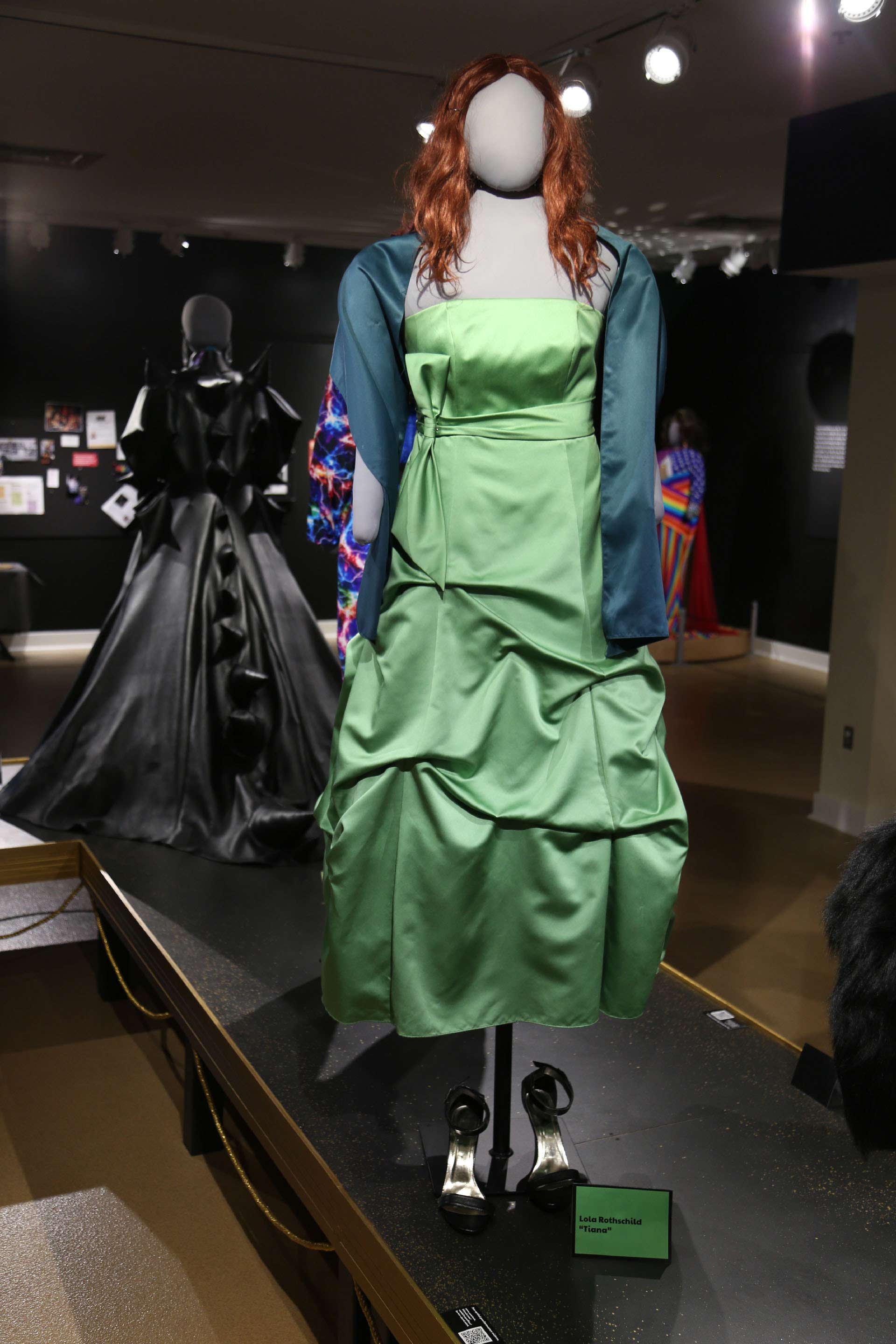 mannequin in long green dress