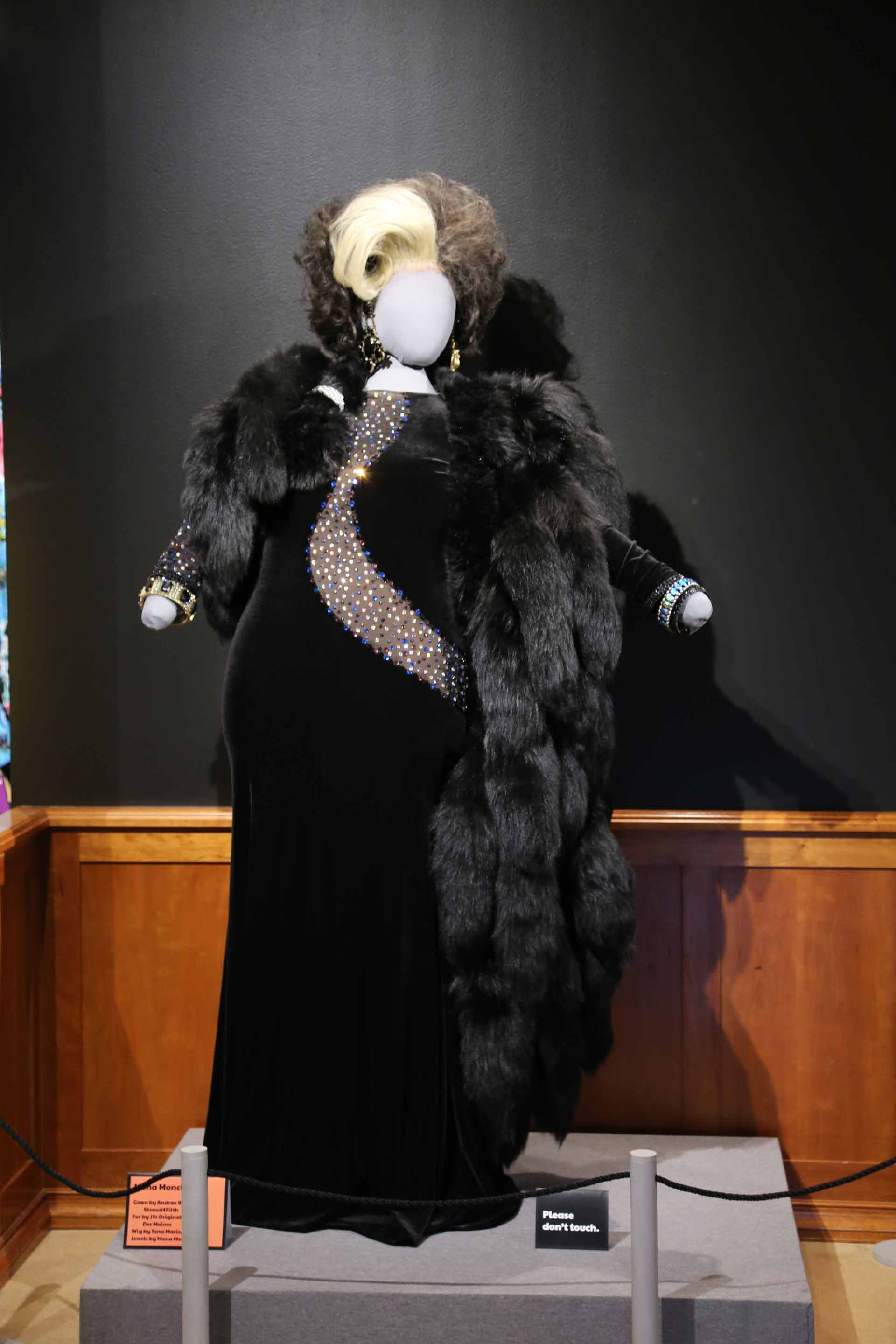 mannequin in black velvet drag queen costume