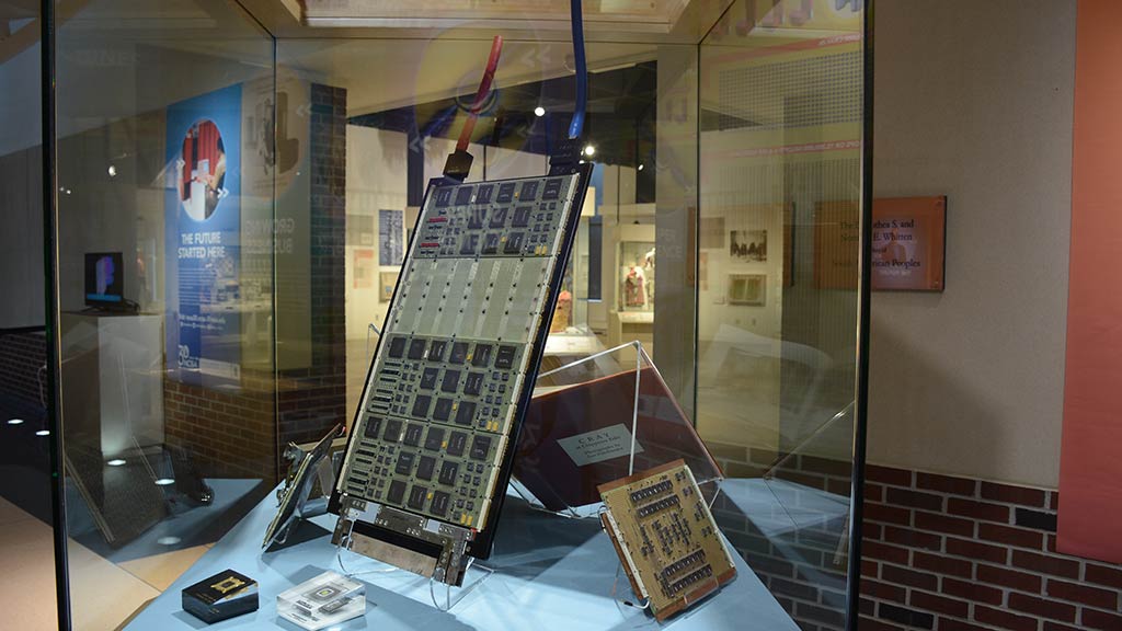 rectangular electronic board attached to two large cables