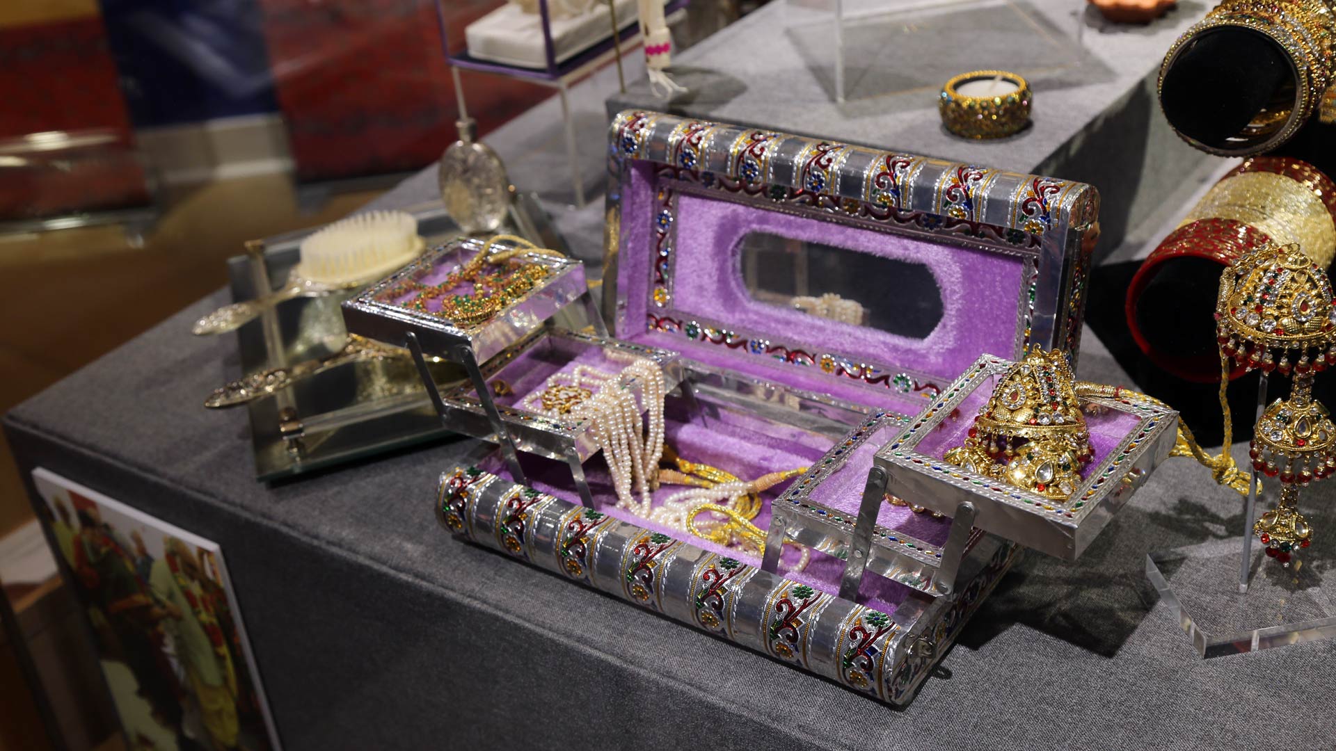 more jewelry in a decorative box