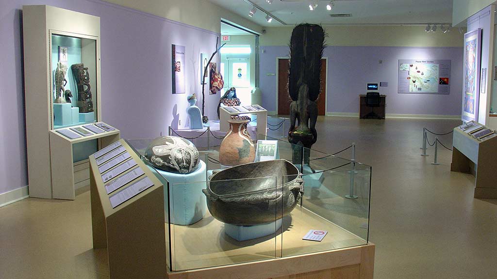 gallery view from the back of the exhibit with many objects shown