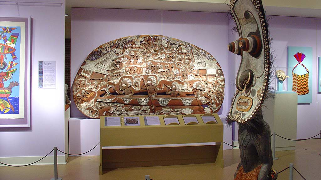 figure and a large story board sculpture