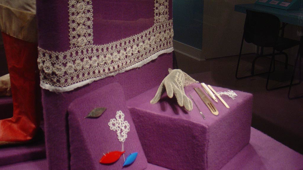 intricate hollow out patterns, glove, sewing tools